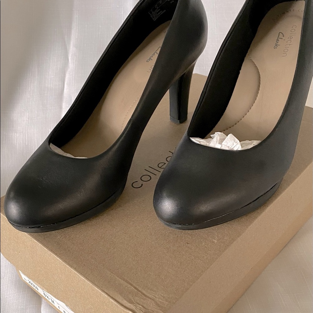 Black leather Clark’s pumps